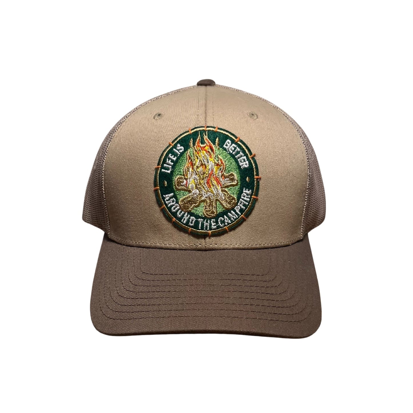 Brown cap with a circular emblem featuring text and graphics on a white background