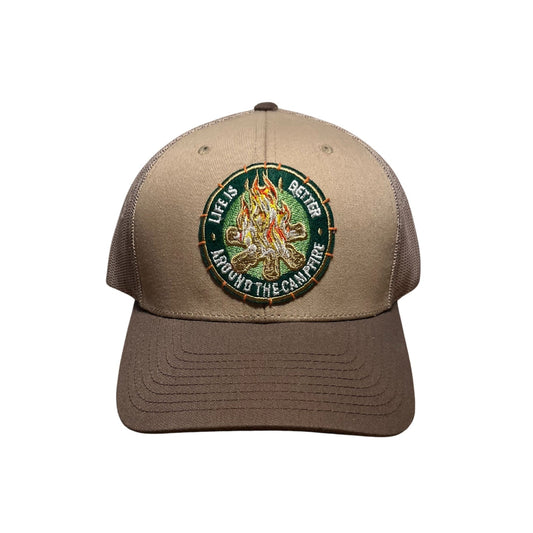 Brown cap with a circular emblem featuring text and graphics on a white background